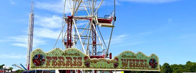 Ferris wheel set up at an outdoor funfair
