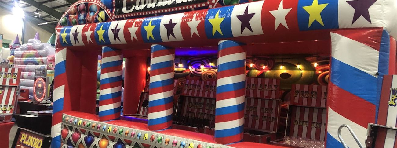 Branded carnival fun fair stalls at an evening corporate event