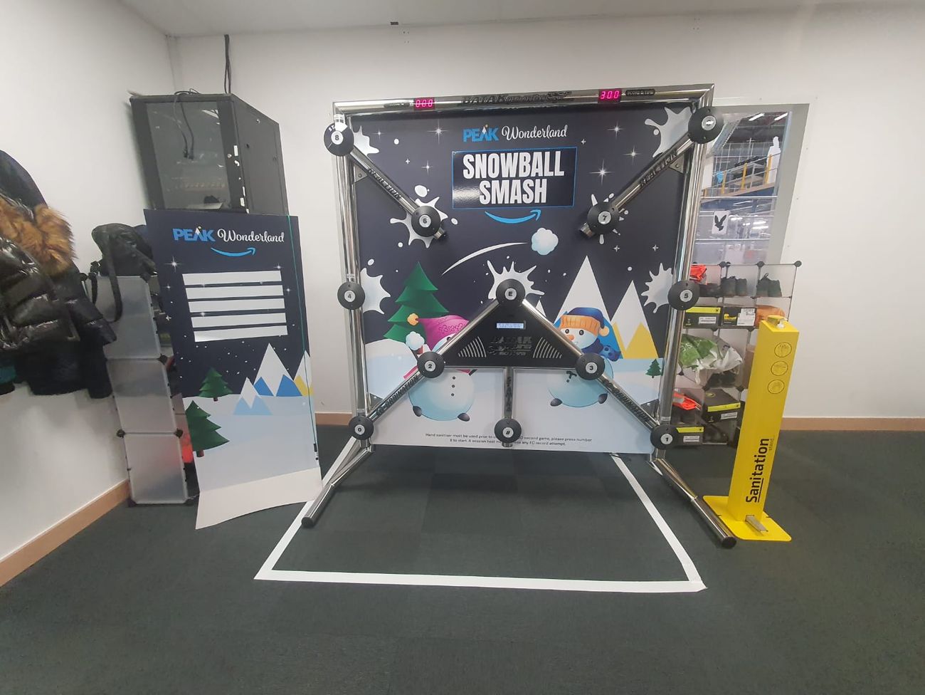 The Snowball Smash Batak Pro with its Peak Wonderland leaderboard and sanitation station, showing the player position marked on the floor