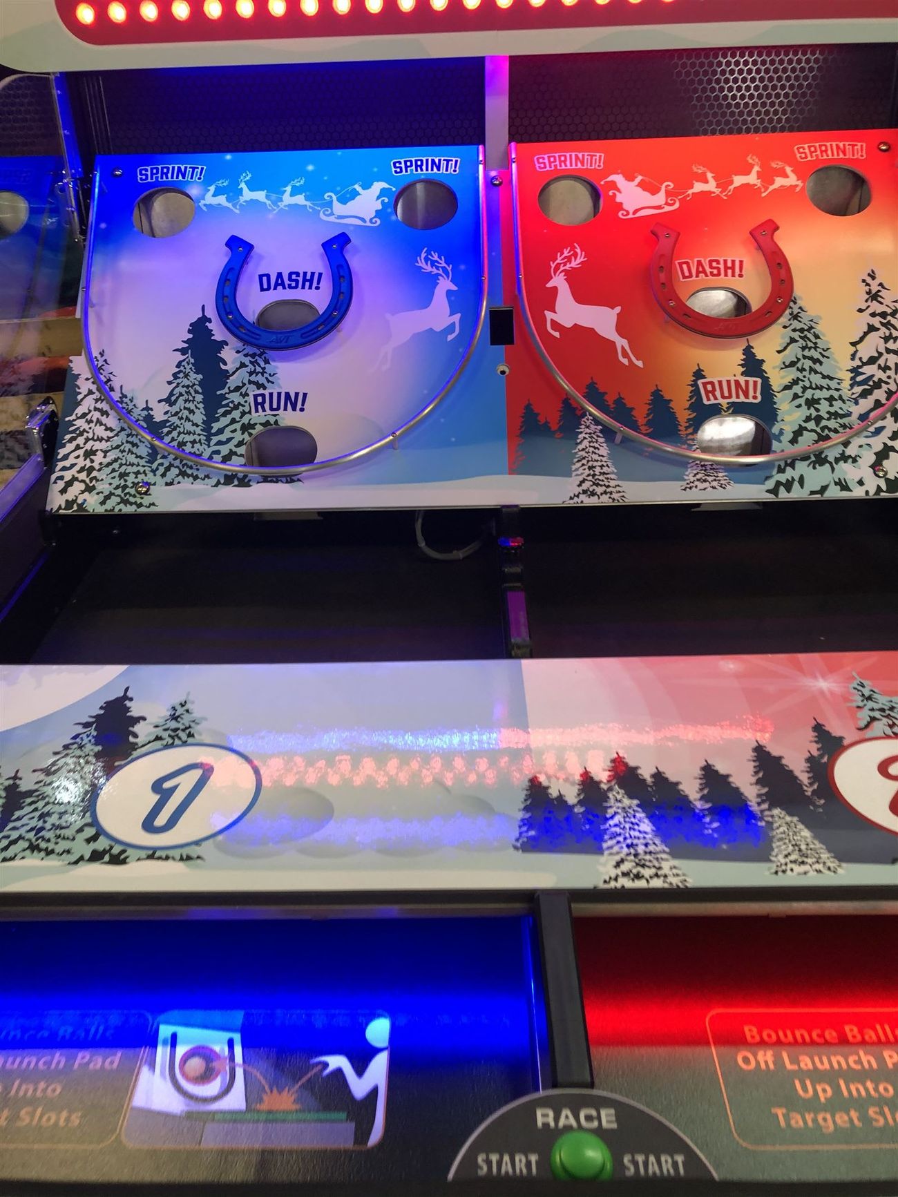 The Bounce A Ball Reindeer Racing start controls with bounce-ball instructions on the cabinet