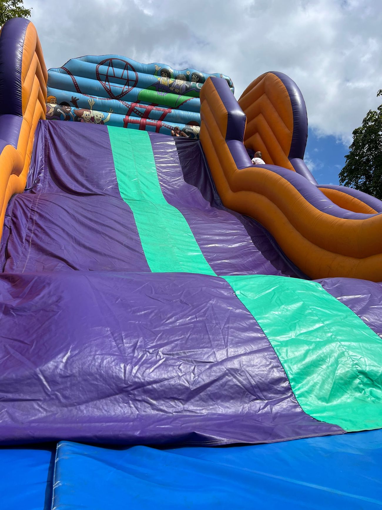 The double-level mega slide viewed from below, emphasising the 25ft height and steepness