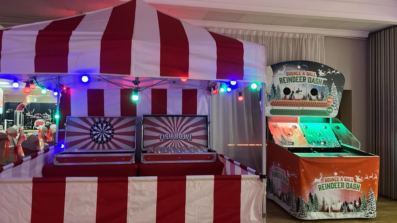 The Fish Bowl Challenge set up indoors at an event, showing the stall works on hard floors