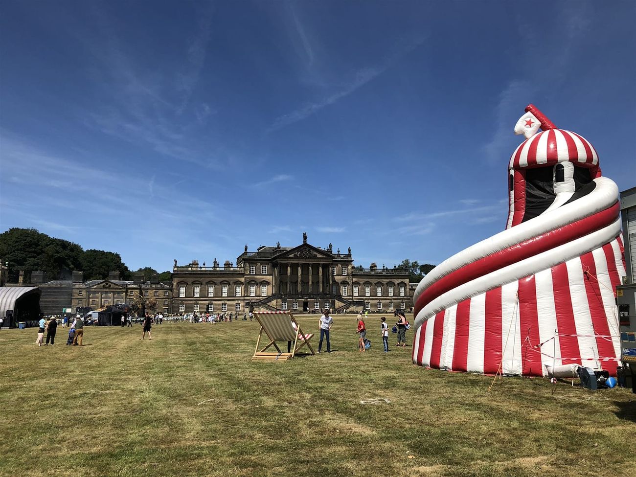 Helter skelter anchored on a country house lawn at Wentworth Woodhouse with the historic building behind