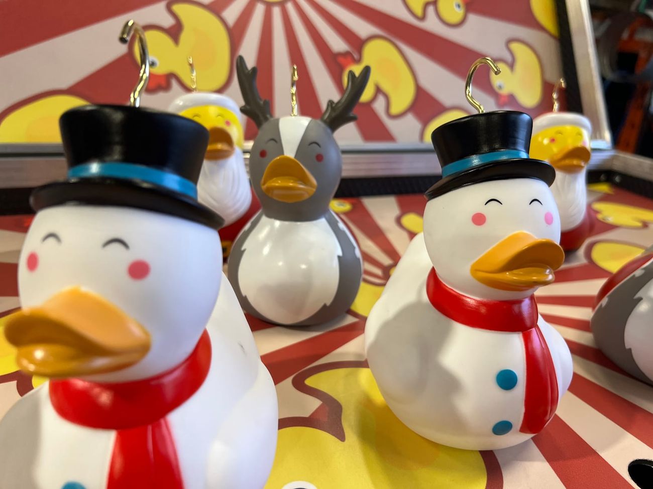 Festive snowmen, reindeer and Santa ducks with their hooks fitted, ready for the board