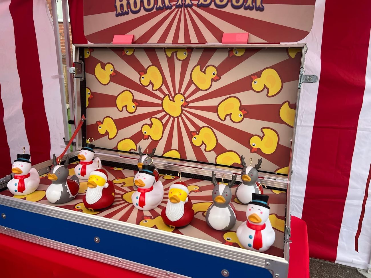 Festive Hook-a-Duck flight-case unit with snowman, reindeer and Santa ducks on the board