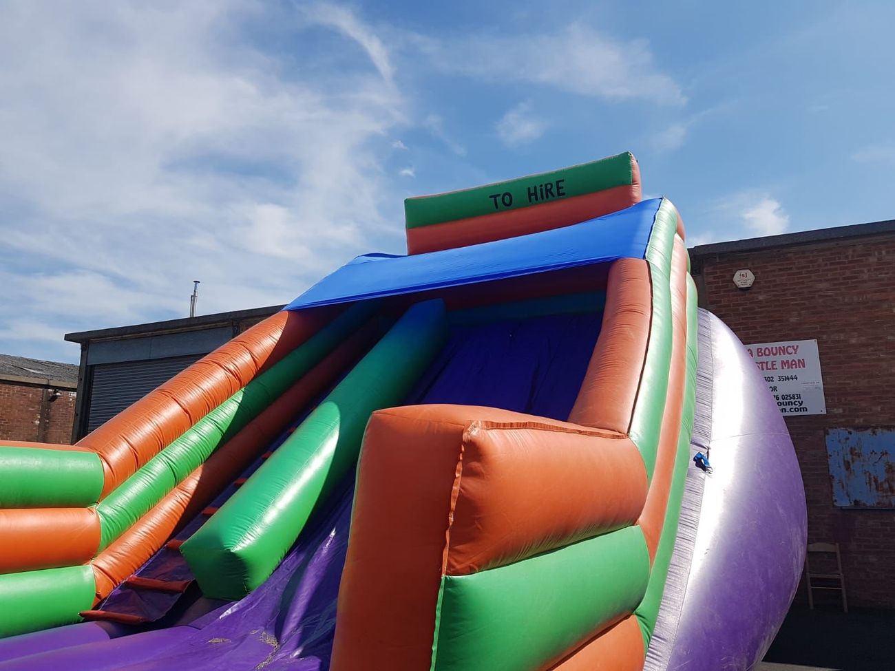 The Mega Purple Slide viewed from below, showing the height and colour scheme