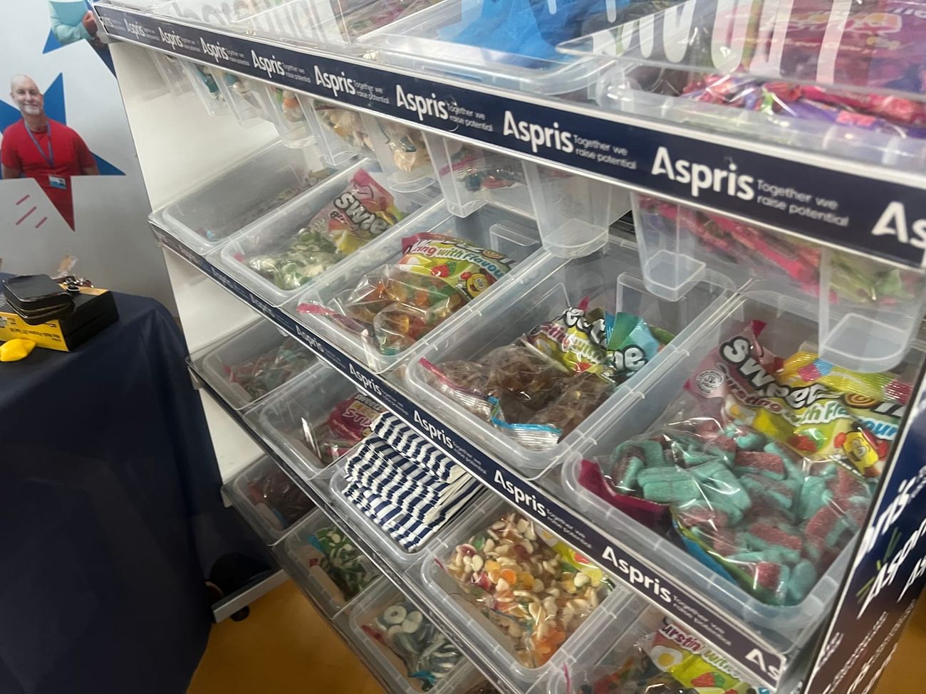 Close-up of the multi-tiered bins, each filled with a different sweet