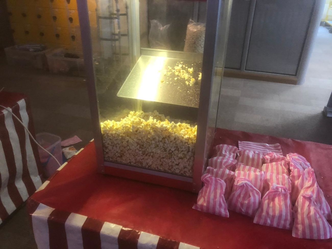 Inside the popcorn machine, with a mound of freshly popped sweet popcorn