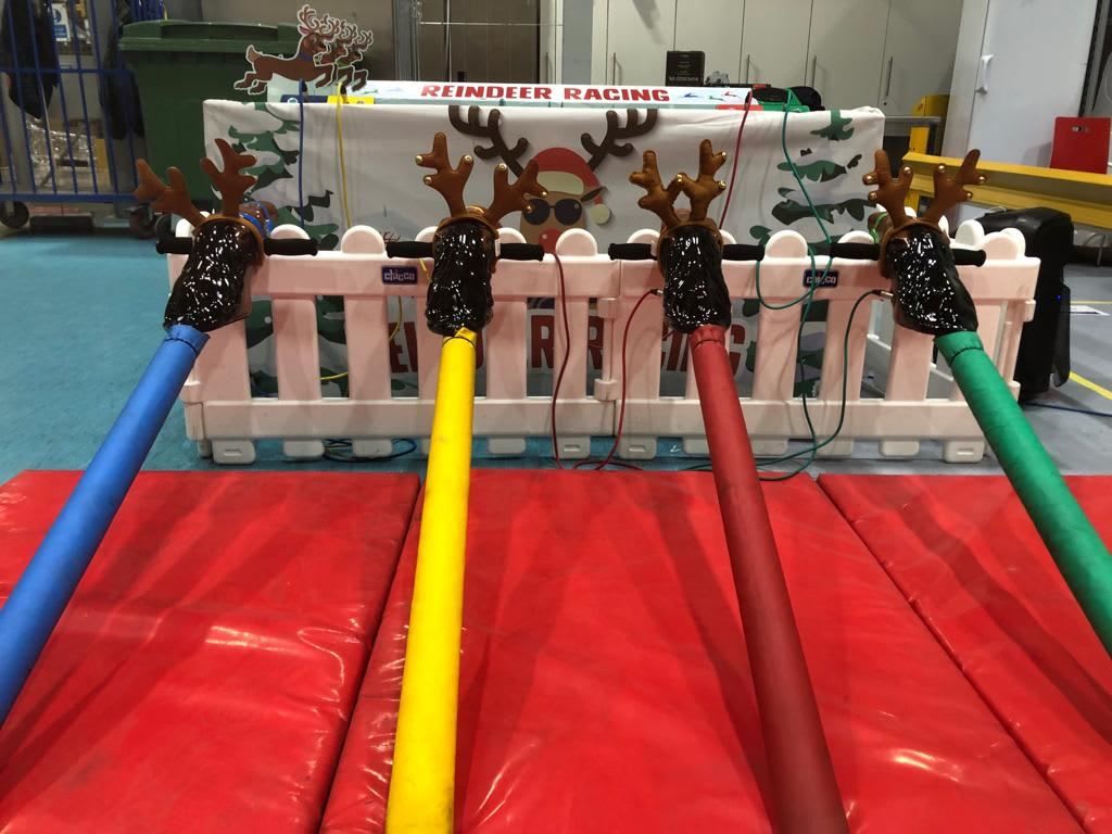 All four colour-coded Reindeer Racing controls standing ready on the red safety mats