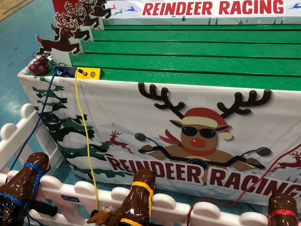 The Rudolph banner across the front of the Reindeer Racing four-lane track