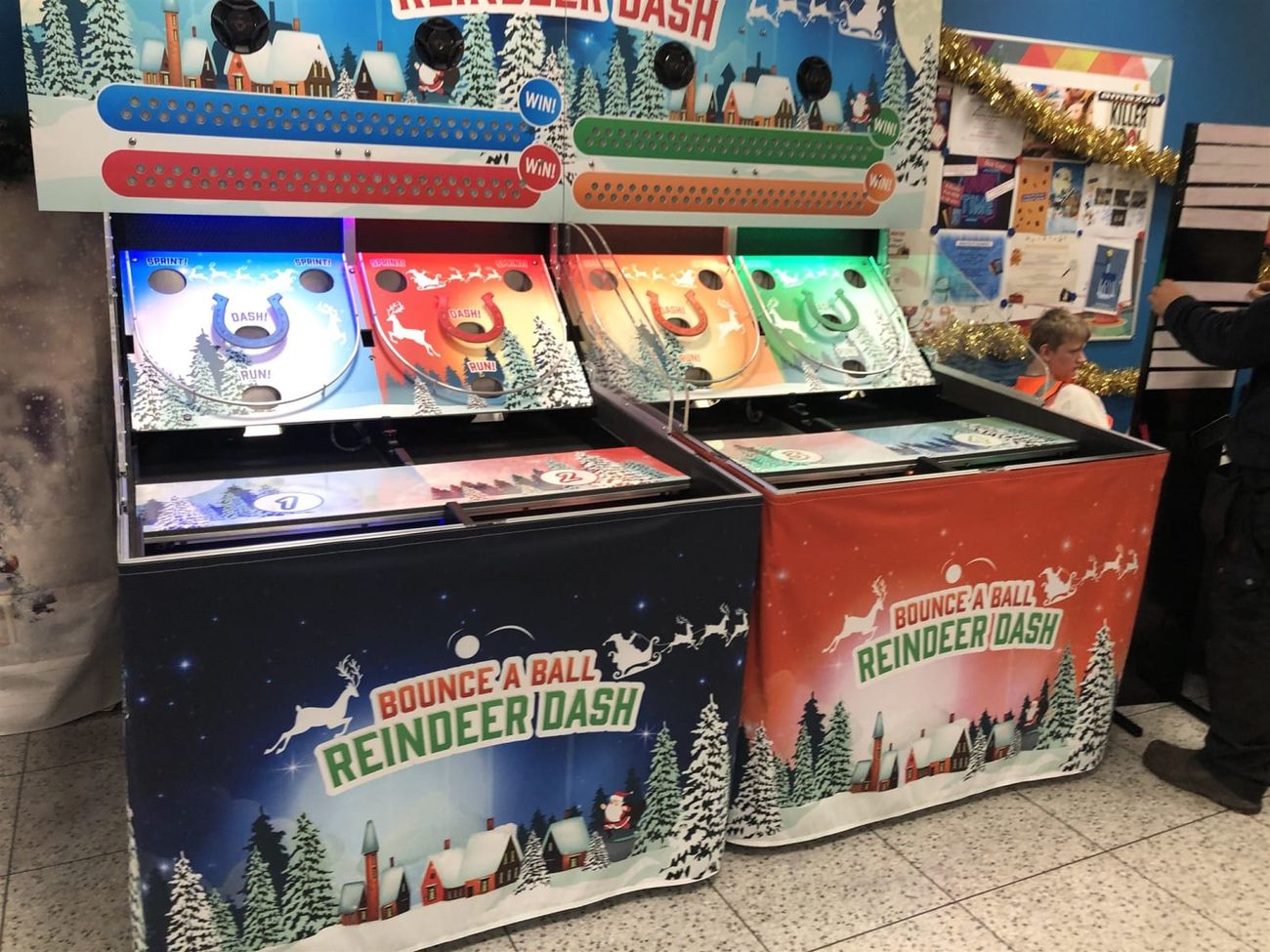 Two Roll A Ball Reindeer Racing units linked side by side for the four-player race