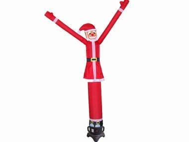 Studio shot of the Santa sky dancer on a plain background, showing the full inflated shape and black blower base