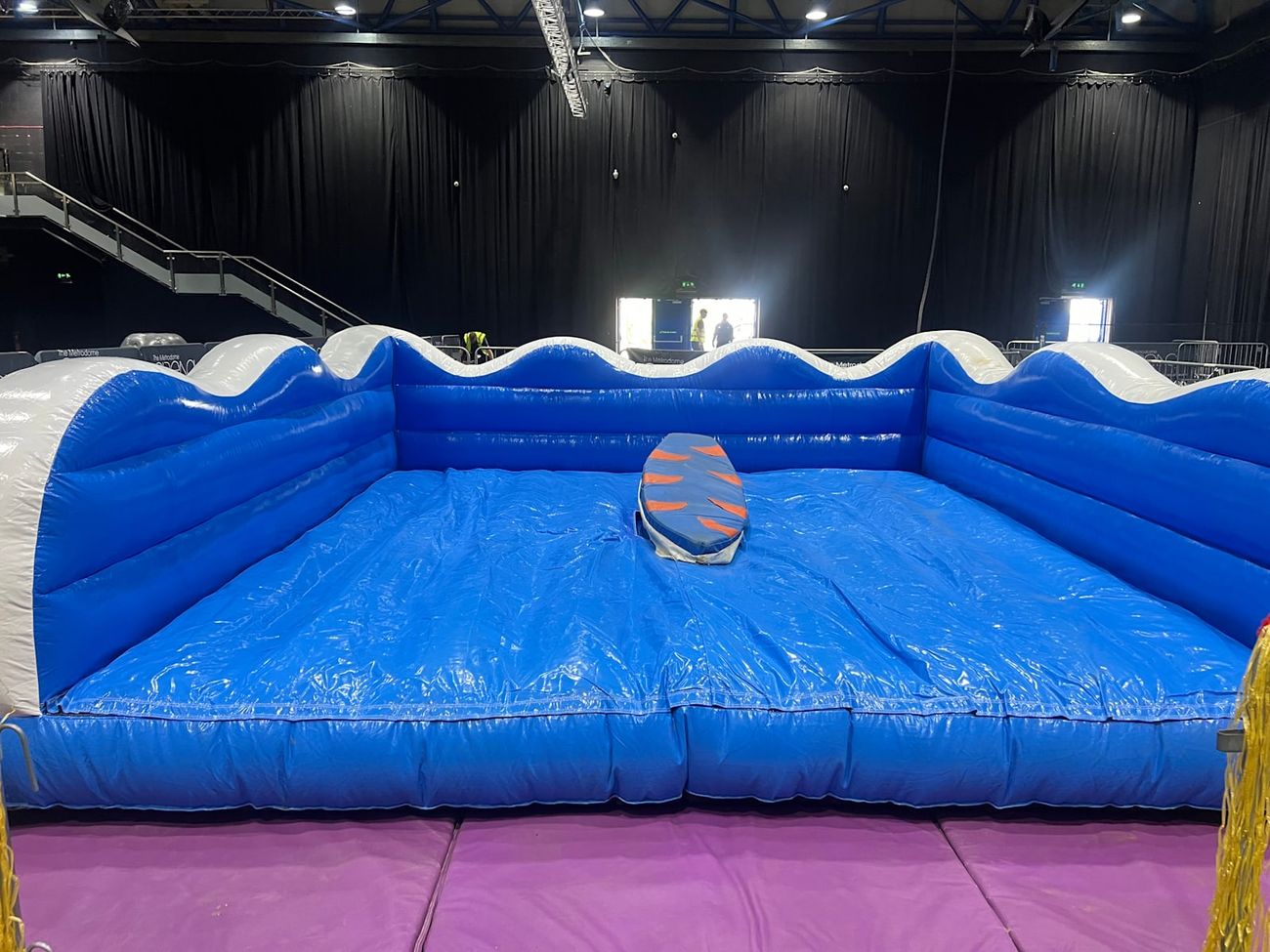 The surfboard platform detail, set up indoors at an event