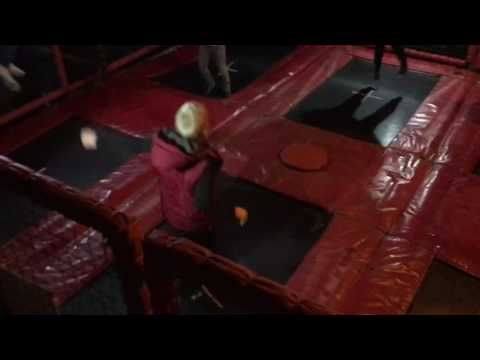 The six bed trampoline set running at an outdoor event with children bouncing in the bays